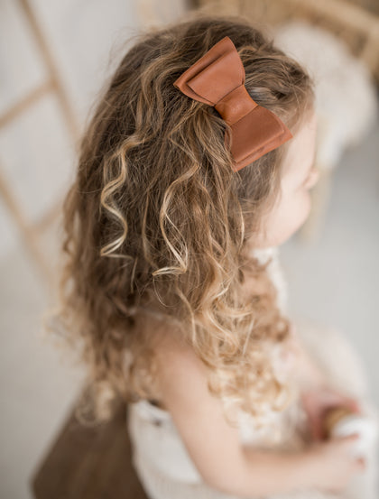 Poopua nahkakoru rusetti nahkarusetti